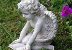 garden fairy reading book statue